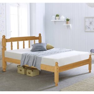 Coleton Spindle Wooden Double Bed In Waxed Pine